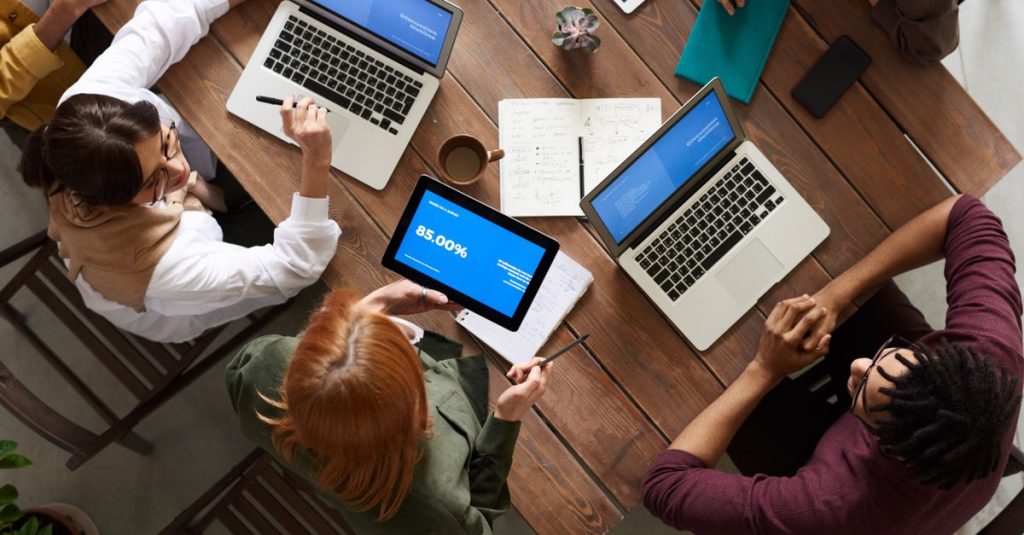 A digital strategist analyzing security, SEO, and authenticity in a modern workspace